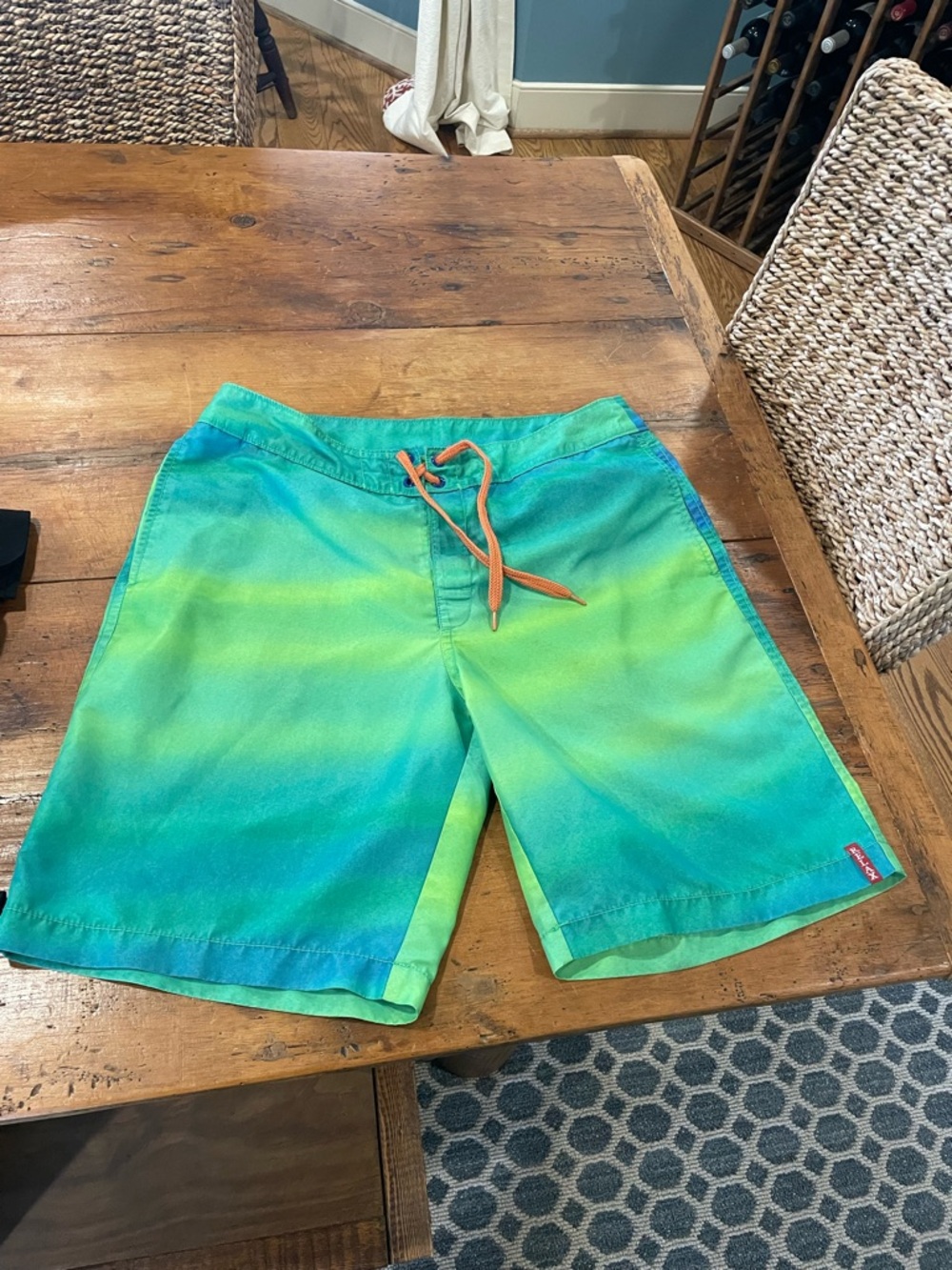 Tommy Bahama Green and Teal Ombre Swim Shorts with Orange drawstring.